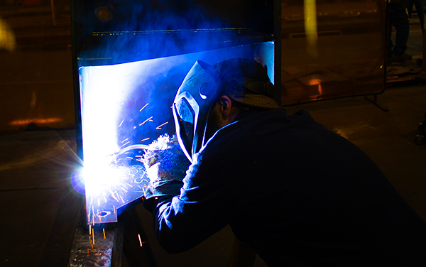 Certified welders perform full tank welding; welds are ground smooth for a clean finish